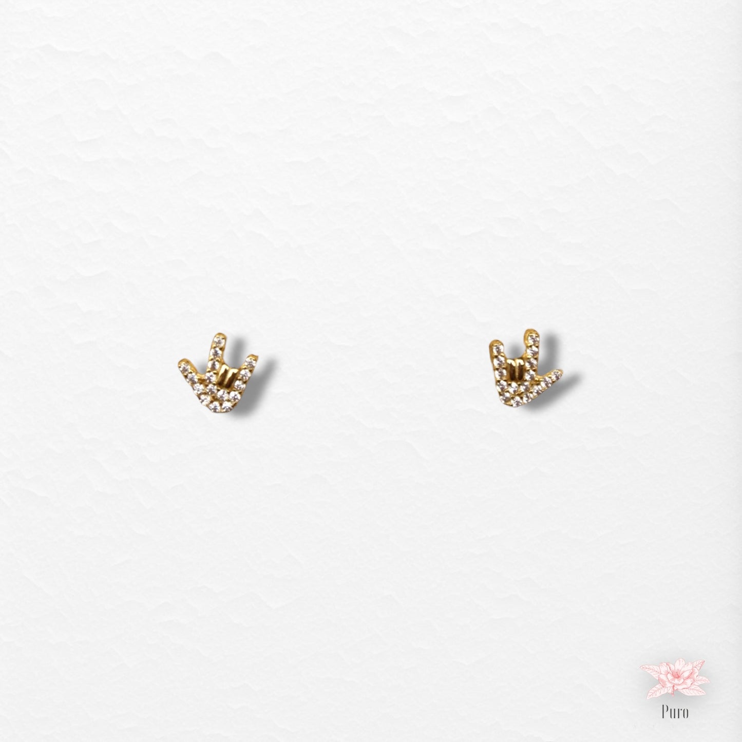 Pendientes de mano de rock and roll
